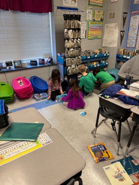Today we had a special reader, Addie Huss. She shared, “The Night Before Christmas.” Then she stuck around to play board games with the class. 