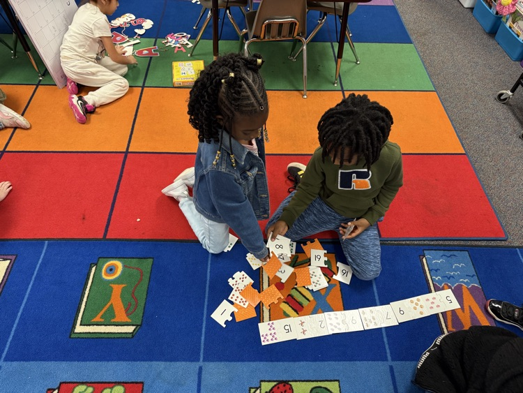 class working on number, letter, and shape recognition