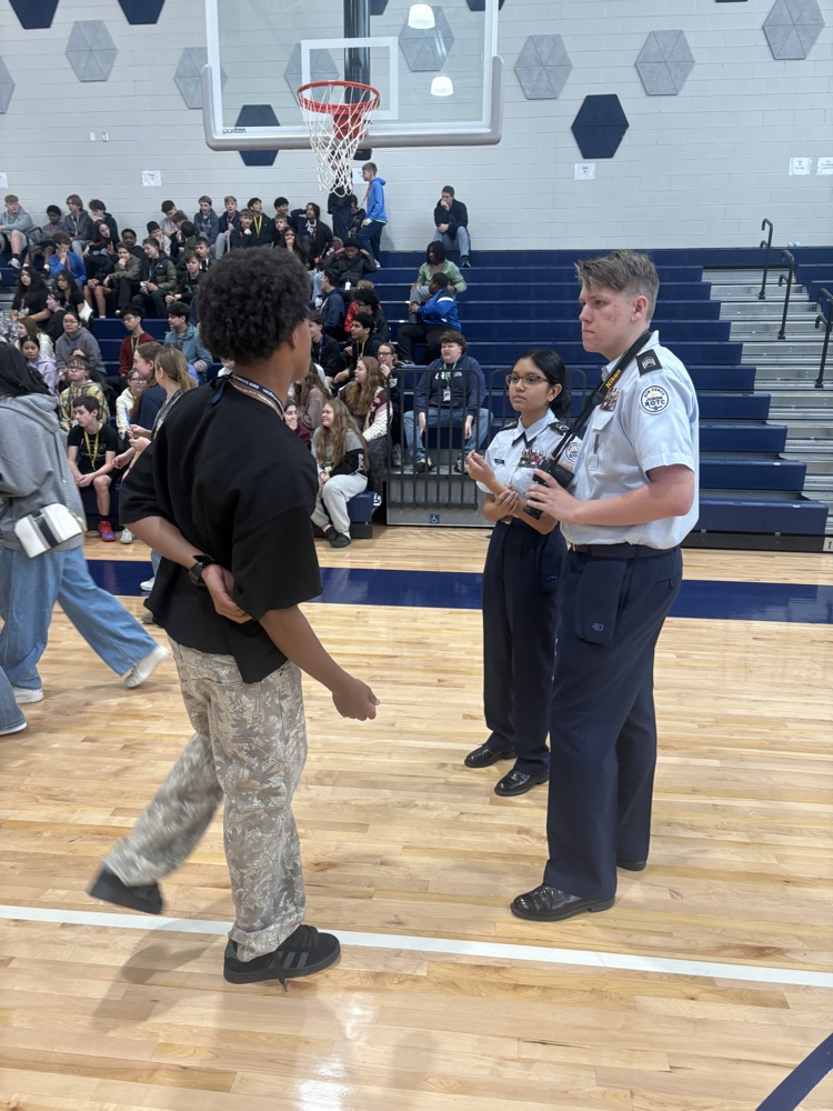 students working hands-on in the gym