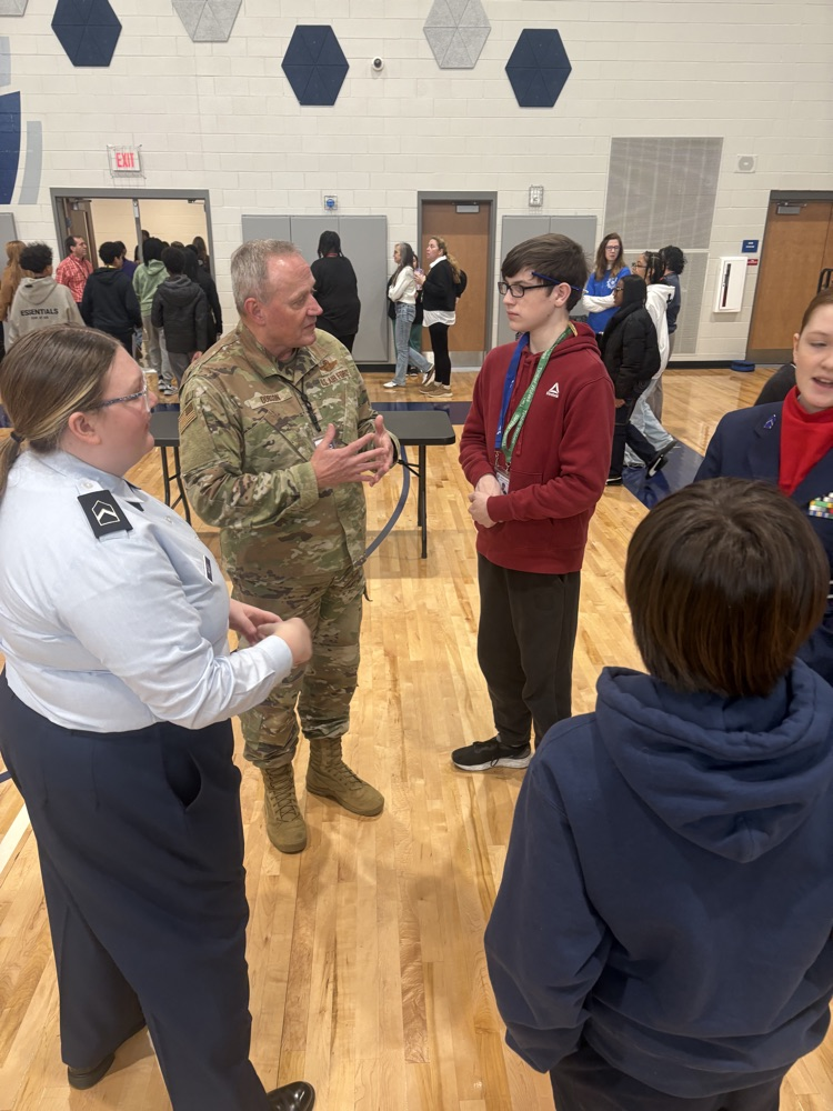 students working hands-on in the gym