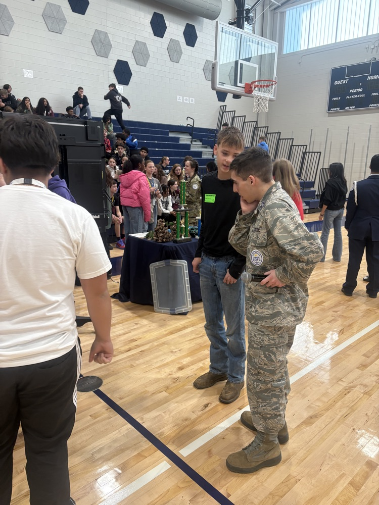 students working hands-on in the gym