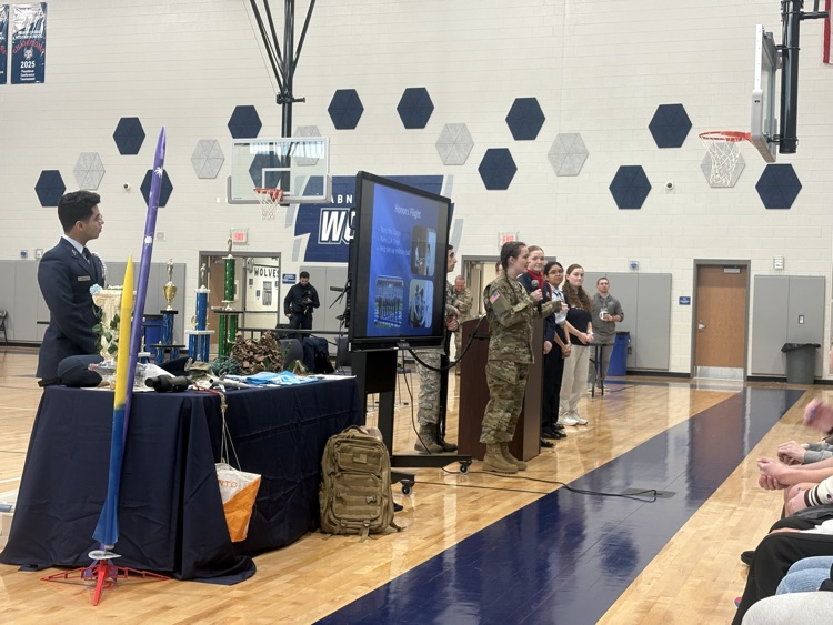 students working hands-on in the gym