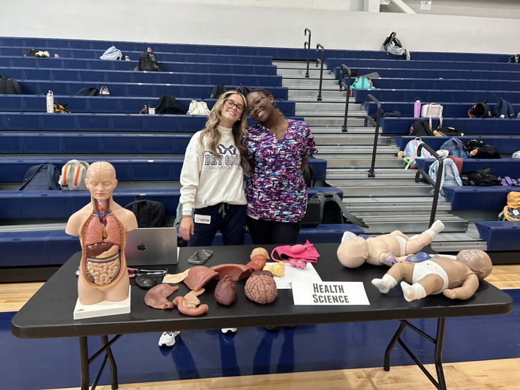 students working hands-on in the gym