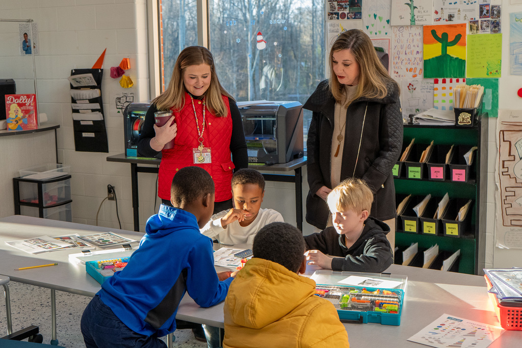 Meredith Gergley and teacher with students