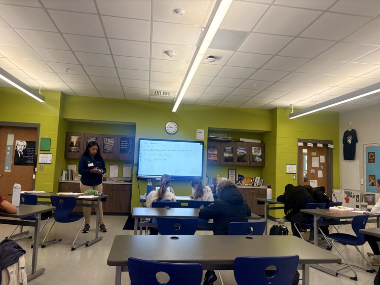 students working with visitor