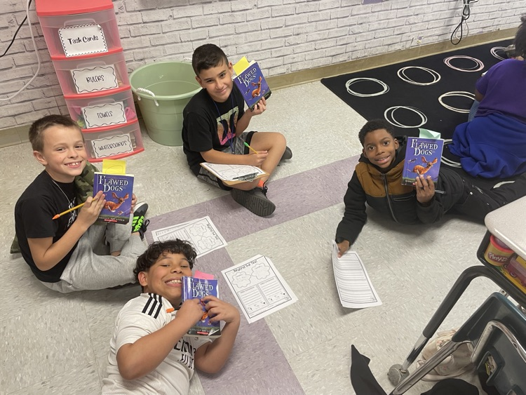 We started book clubs today. They are making predictions and connections.