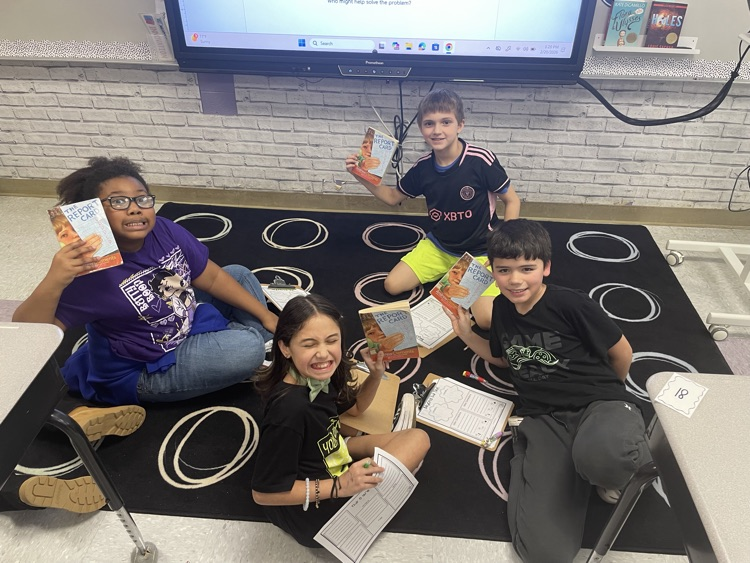 We started book clubs today. They are making predictions and connections.