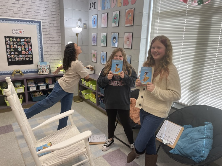 We started book clubs today. They are making predictions and connections.