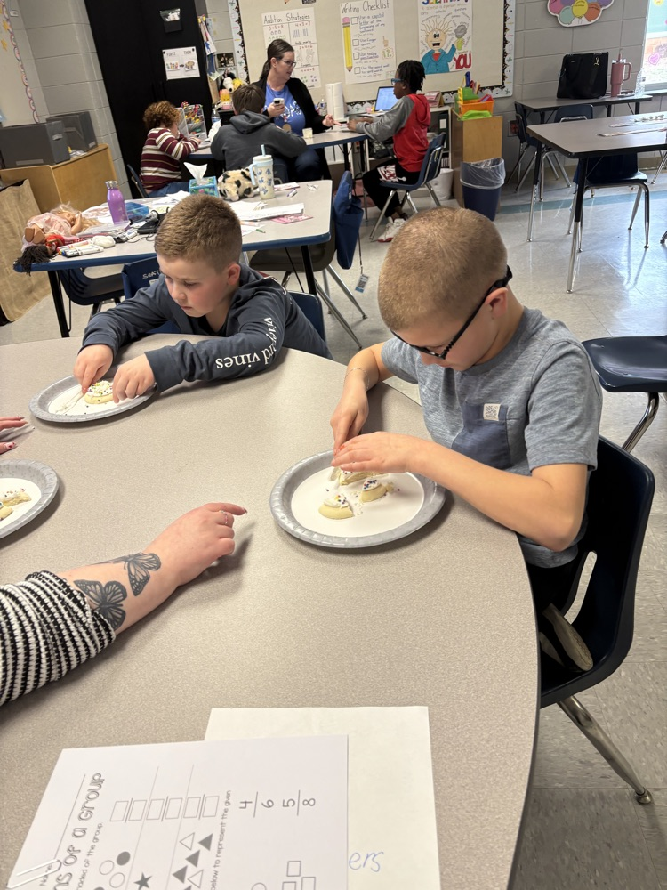 We are learning about fractions and the students were able to show their knowledge by cutting different fractions on their cookie.