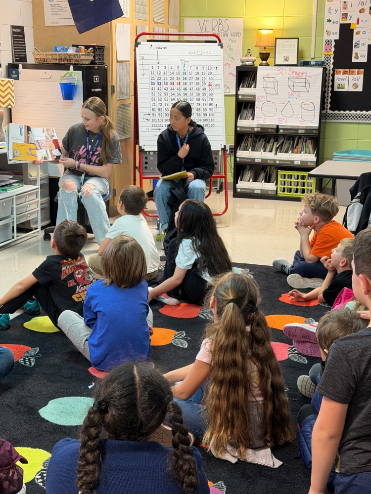 ACM kids reading at ACA