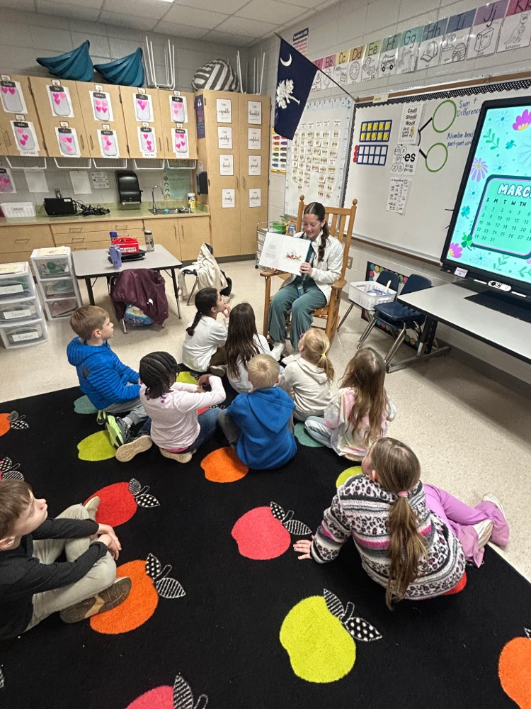 ACM kids reading at ACA