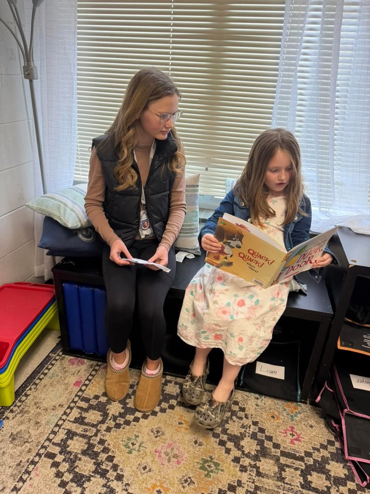 ACM kids reading at ACA