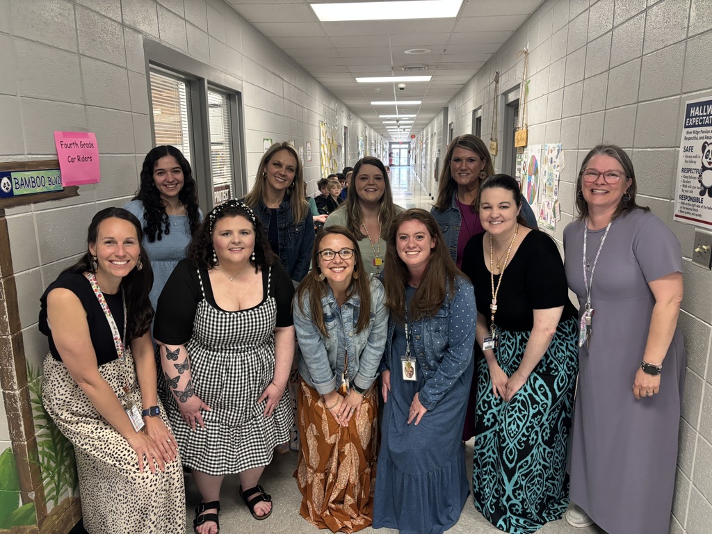 group of teachers wearing long maxi dresses and jean jackets