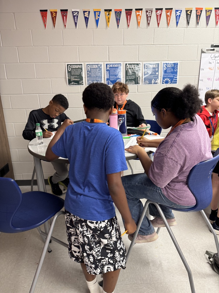kids working on posters