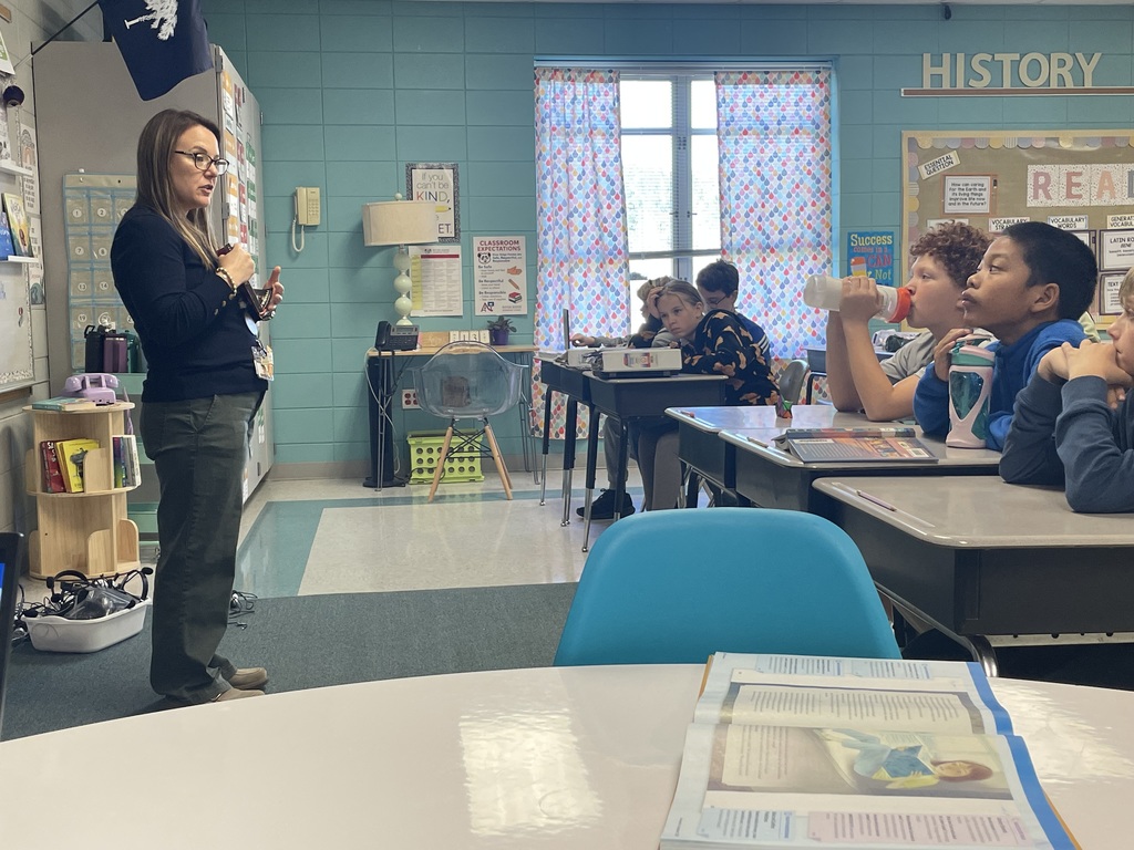 Mrs. Cobb's classes continue with their First Chapter Friday guest readers. They were excited to hear from Mrs. Brock today!