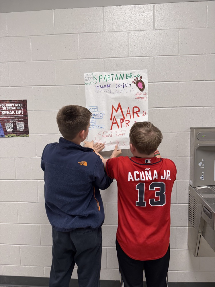 students creating boxes and posters