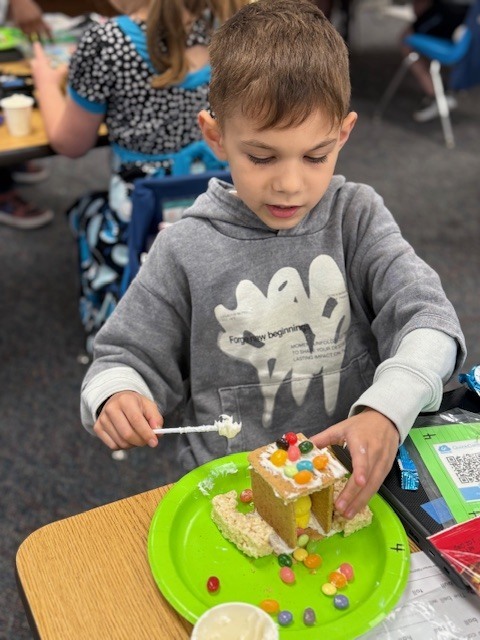 Mrs. Wells’s class had some eggs-tra egg-citing learning activities to go along with the book Rechenka’s Eggs by Patricia Polocco. They built and ate the cutest little Peep houses and measured with jellybeans.