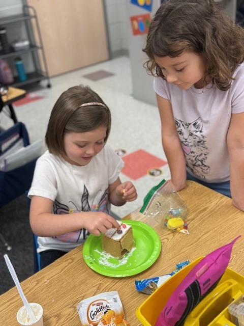 Mrs. Wells’s class had some eggs-tra egg-citing learning activities to go along with the book Rechenka’s Eggs by Patricia Polocco. They built and ate the cutest little Peep houses and measured with jellybeans.