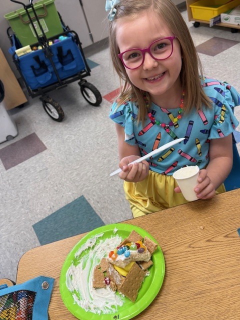 Mrs. Wells’s class had some eggs-tra egg-citing learning activities to go along with the book Rechenka’s Eggs by Patricia Polocco. They built and ate the cutest little Peep houses and measured with jellybeans.