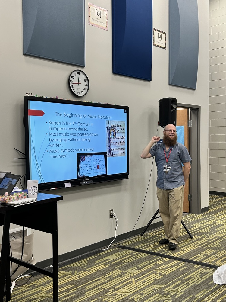 teacher in music class 