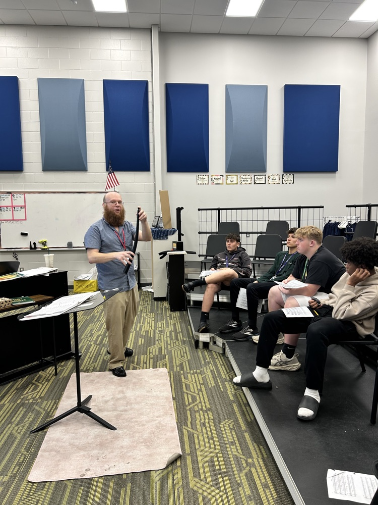 teacher in music class 