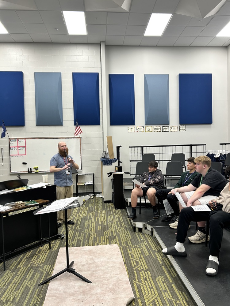 teacher in music class 