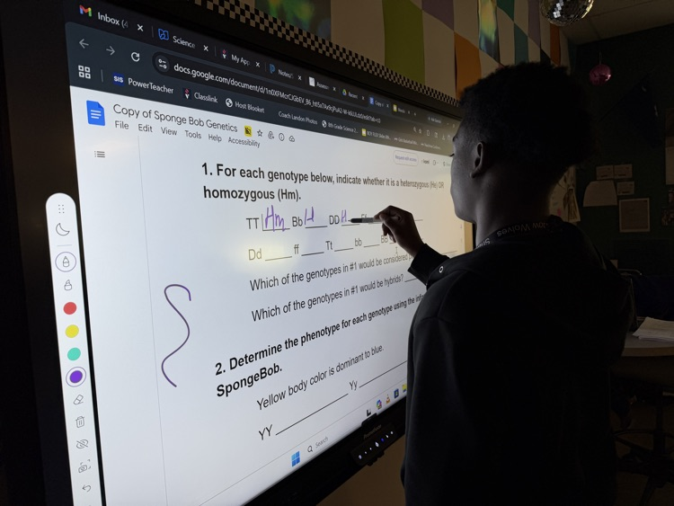 kids doing work at the board 