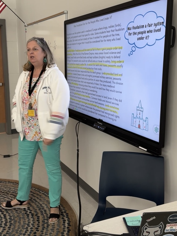 teacher with kids in collab room 