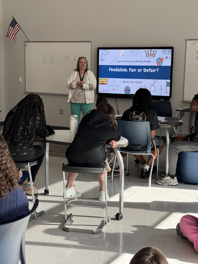 teacher with kids in collab room 