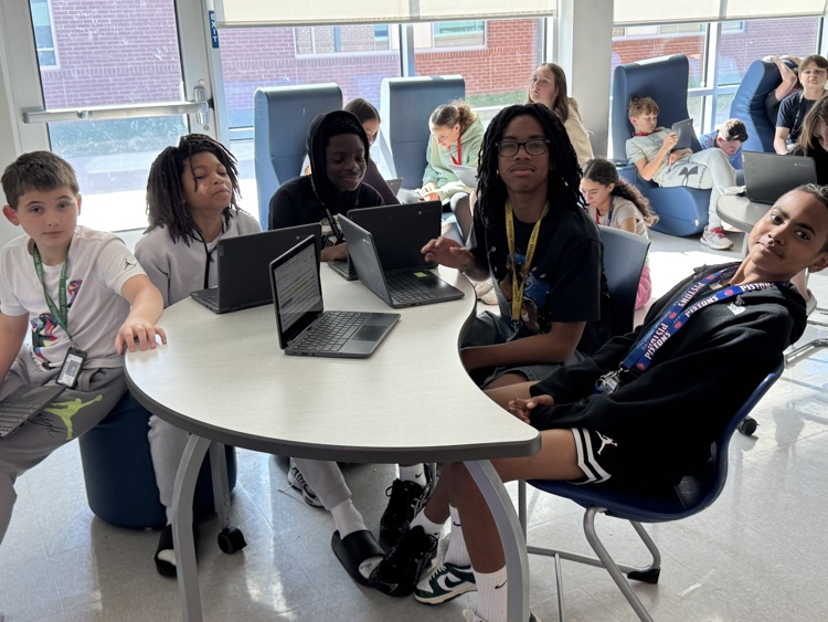 teacher with kids in collab room 