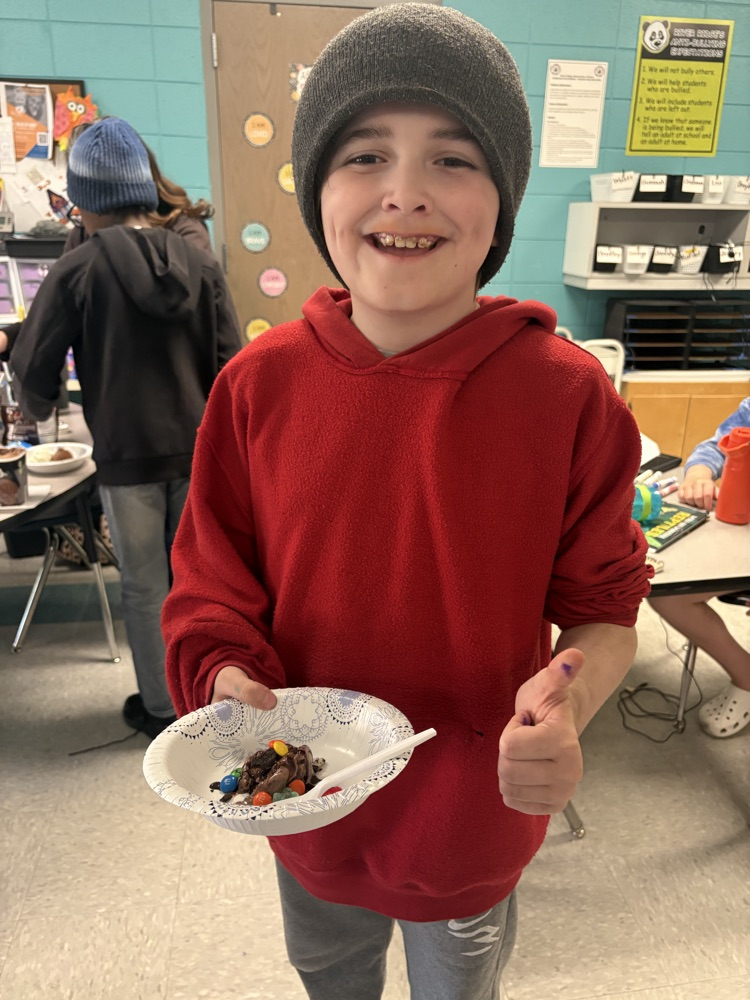 students making ice cream sundaes