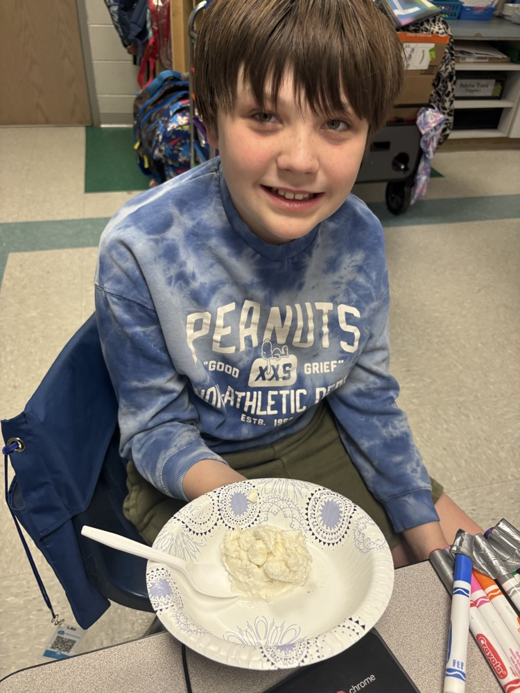 students making ice cream sundaes