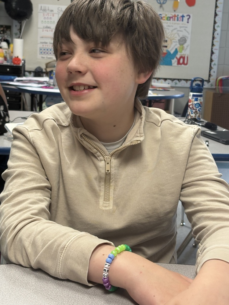 J is for Jewelry Day. The kids made bracelets today.