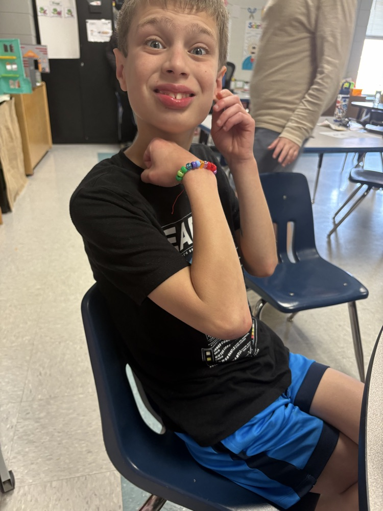 J is for Jewelry Day. The kids made bracelets today.