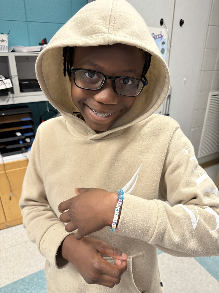 J is for Jewelry Day. The kids made bracelets today.