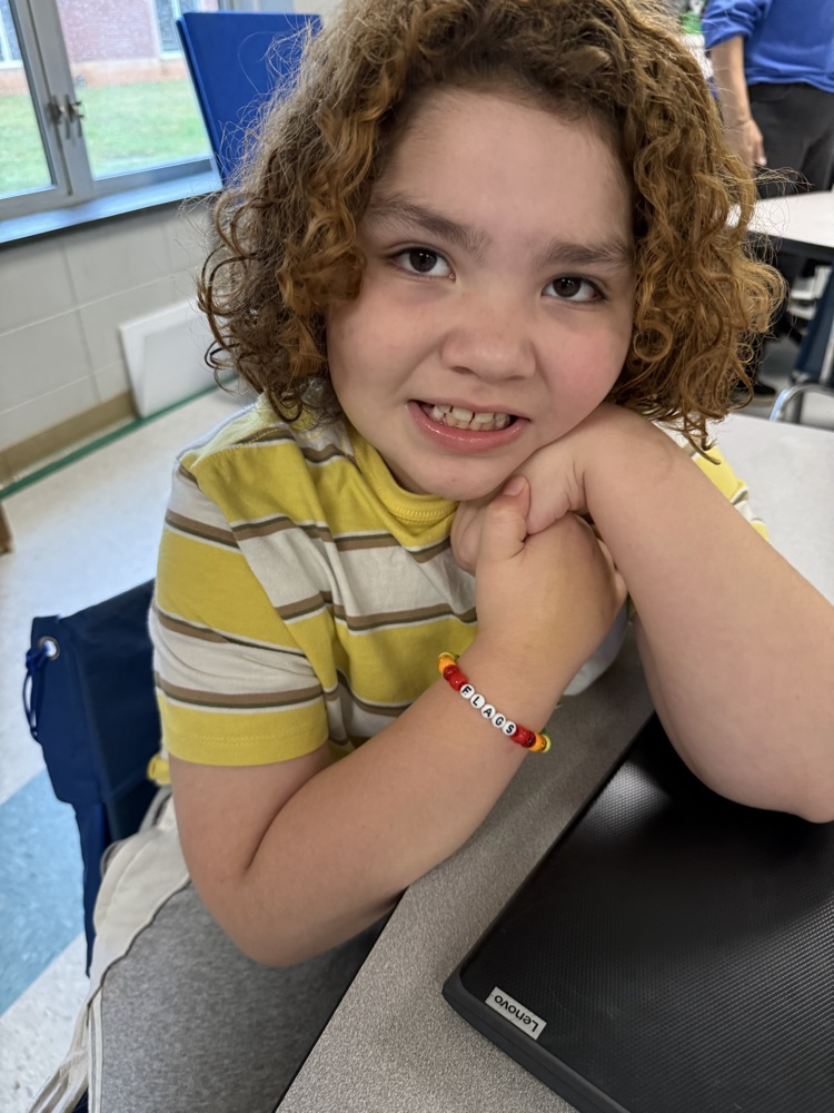 J is for Jewelry Day. The kids made bracelets today.
