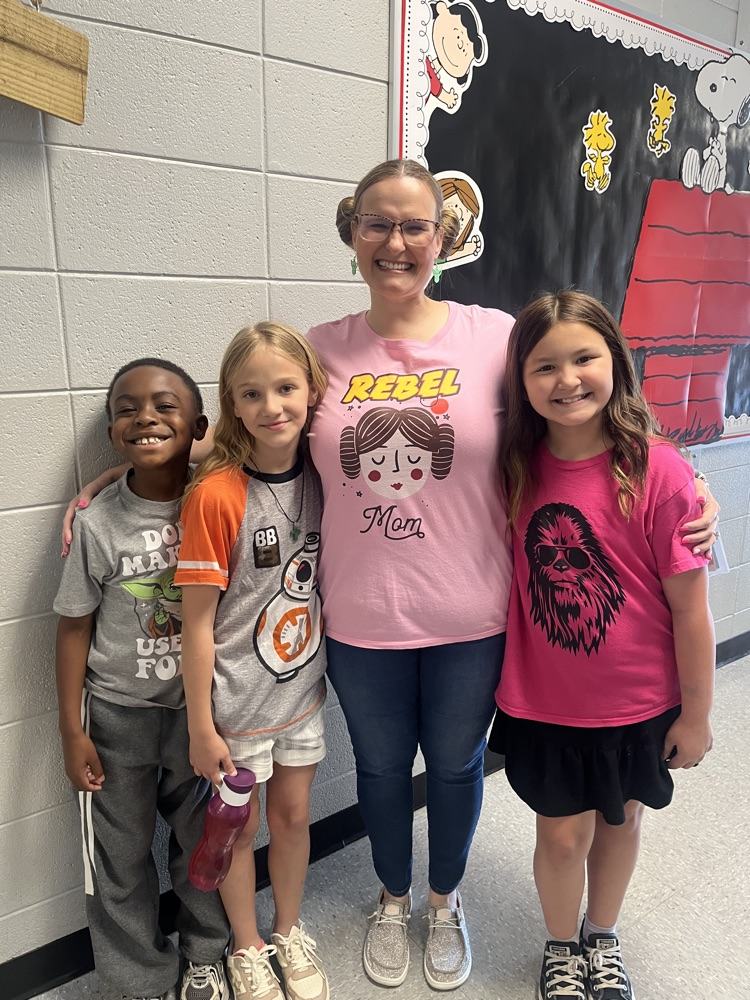 teacher and students in Star Wars clothing 