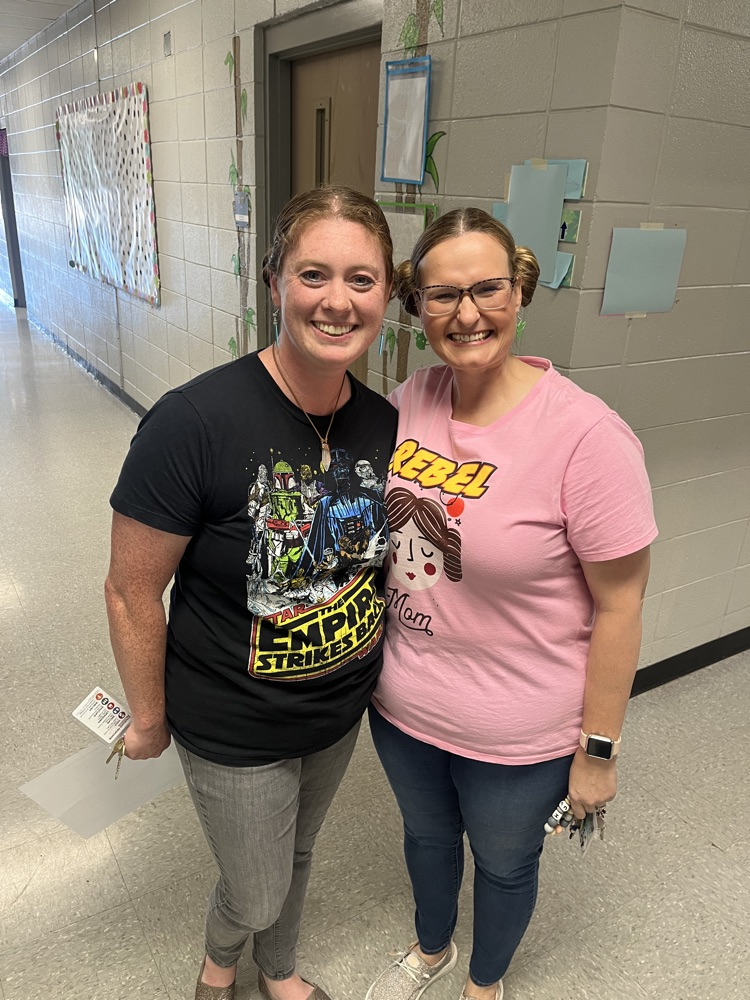 teacher and students in Star Wars clothing 