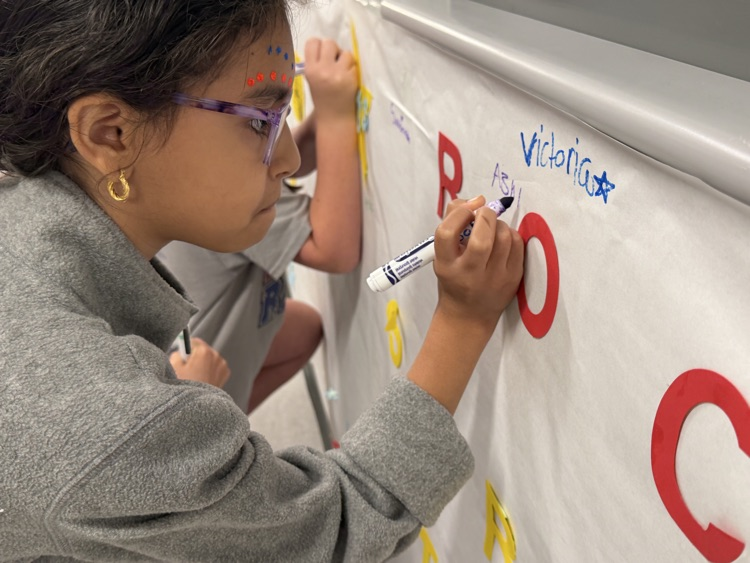 student signing pledge