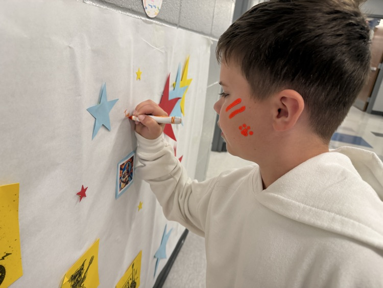 student signing pledge