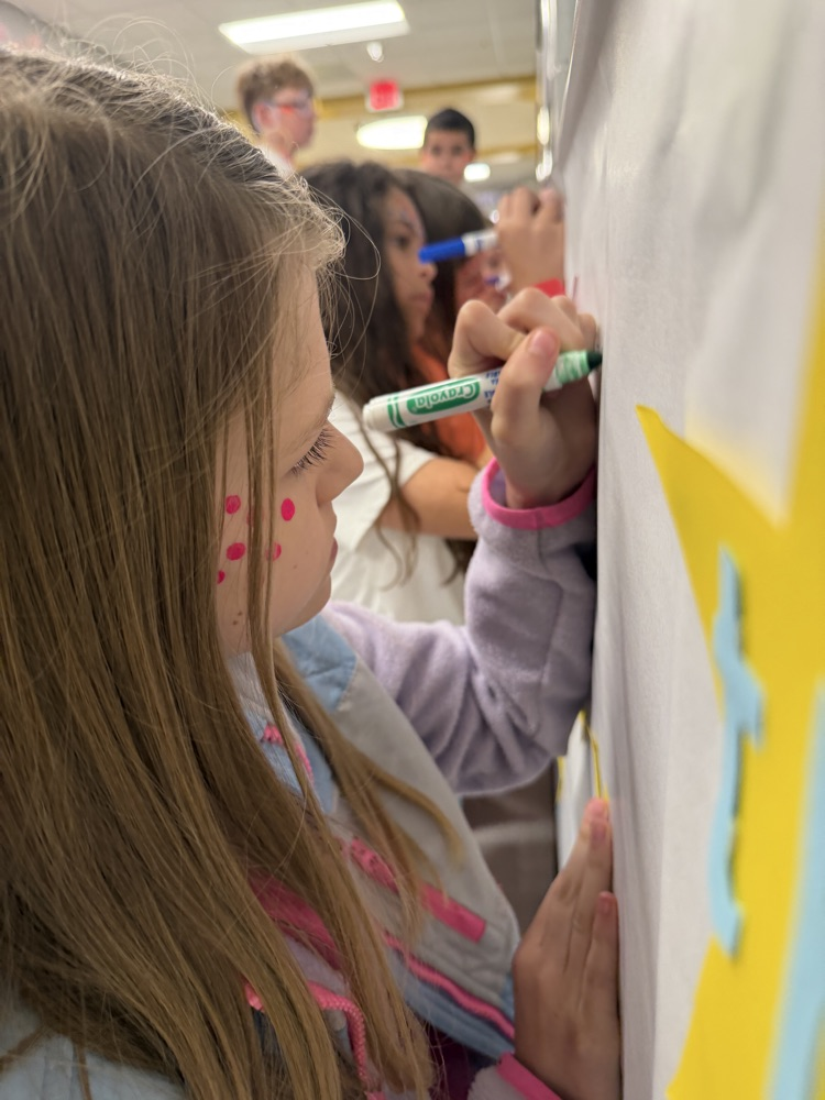 student signing pledge