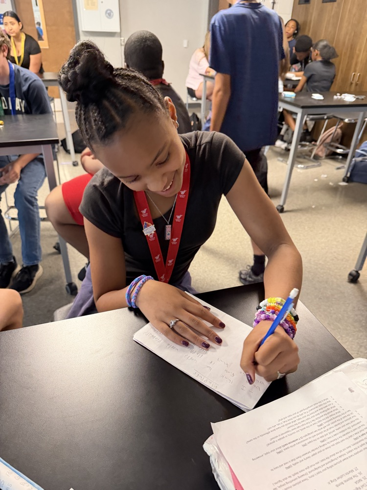 students writing letters