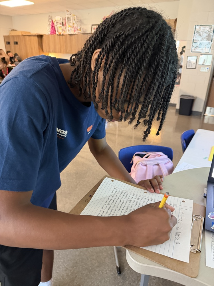 students writing letters