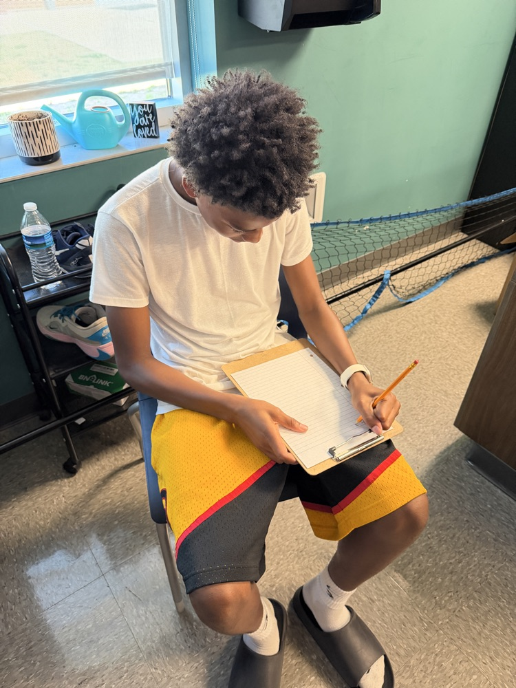 students writing letters