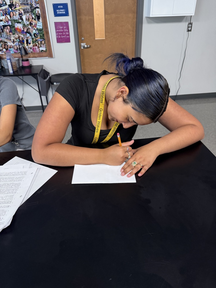 students writing letters