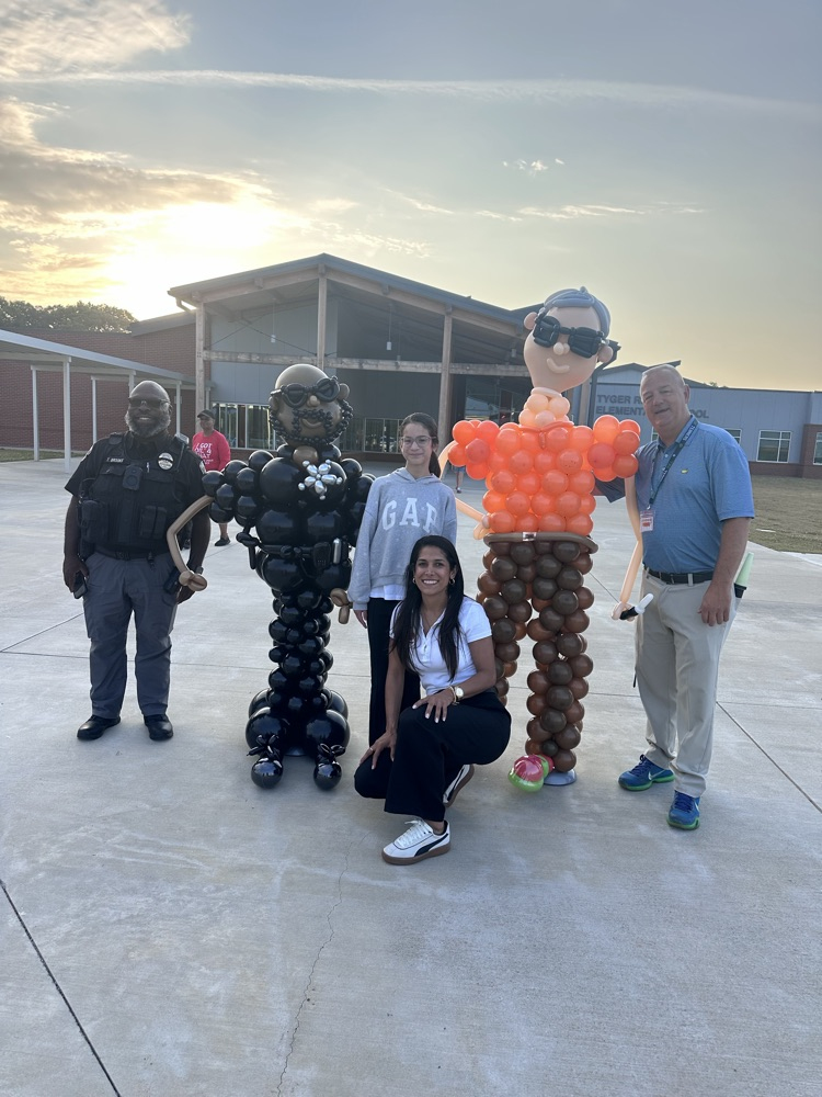 Tyger River principal and SRO with balloon figures