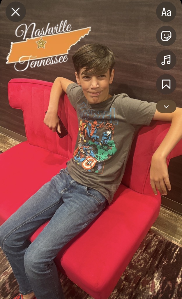 student sitting in a chair in nashville