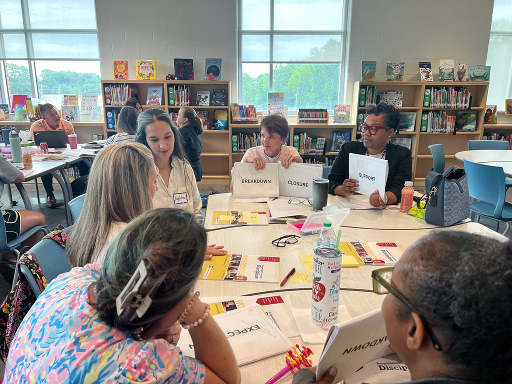 teachers going through responsibility centered discipline training