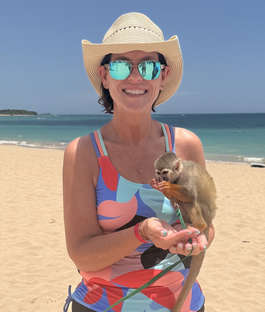 person holding monkey