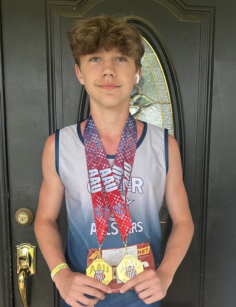 Student wearing medals 